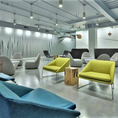Modern interior lounge with contemporary seating at Water’s Edge office campus