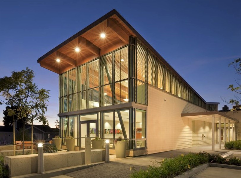 Exterior view of Hoag Hospital in California at sunset, showing modern glass façade and high-rise architecture.