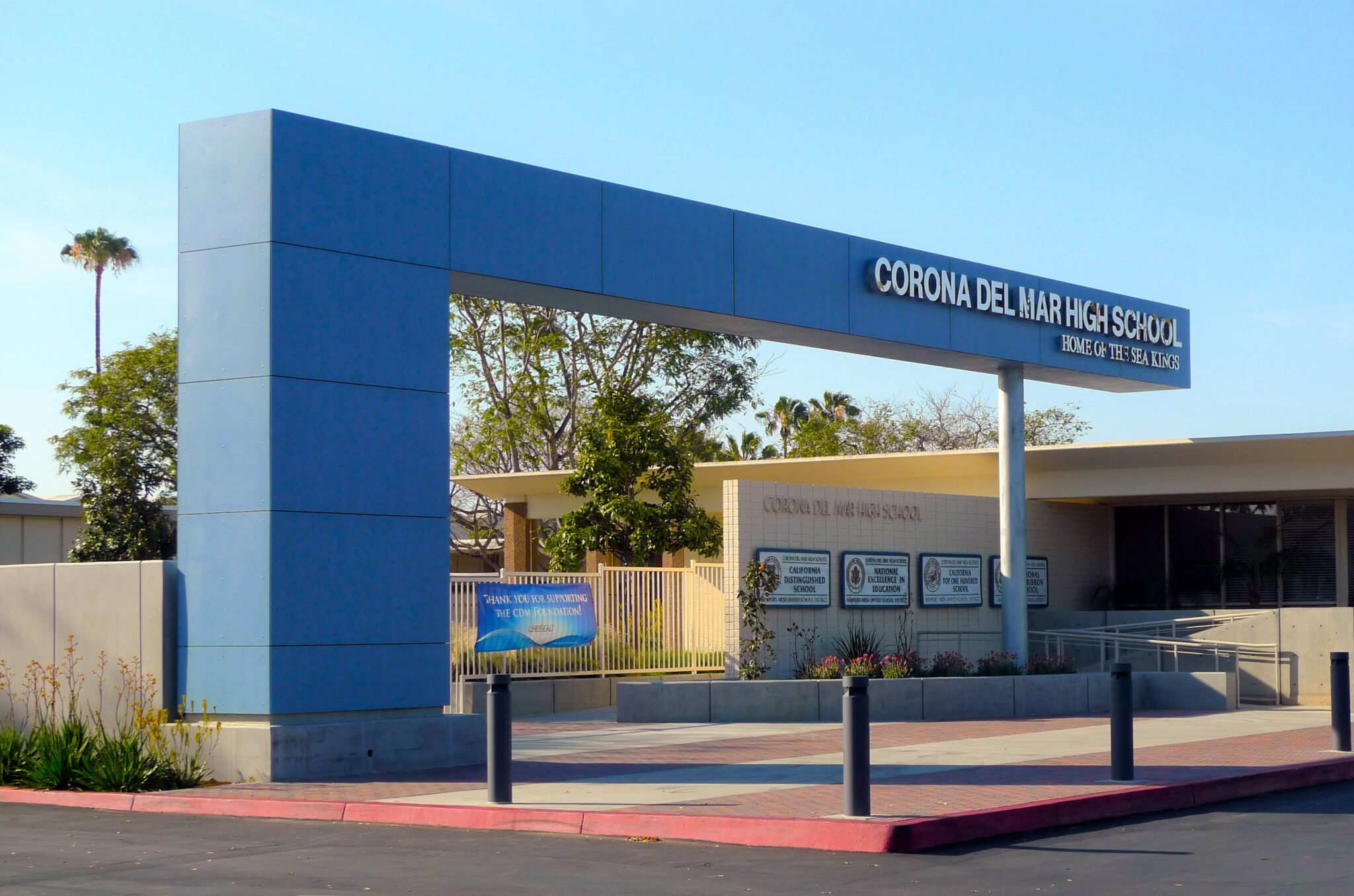 Exterior view of Hoag Hospital in California at sunset, showing modern glass façade and high-rise architecture.