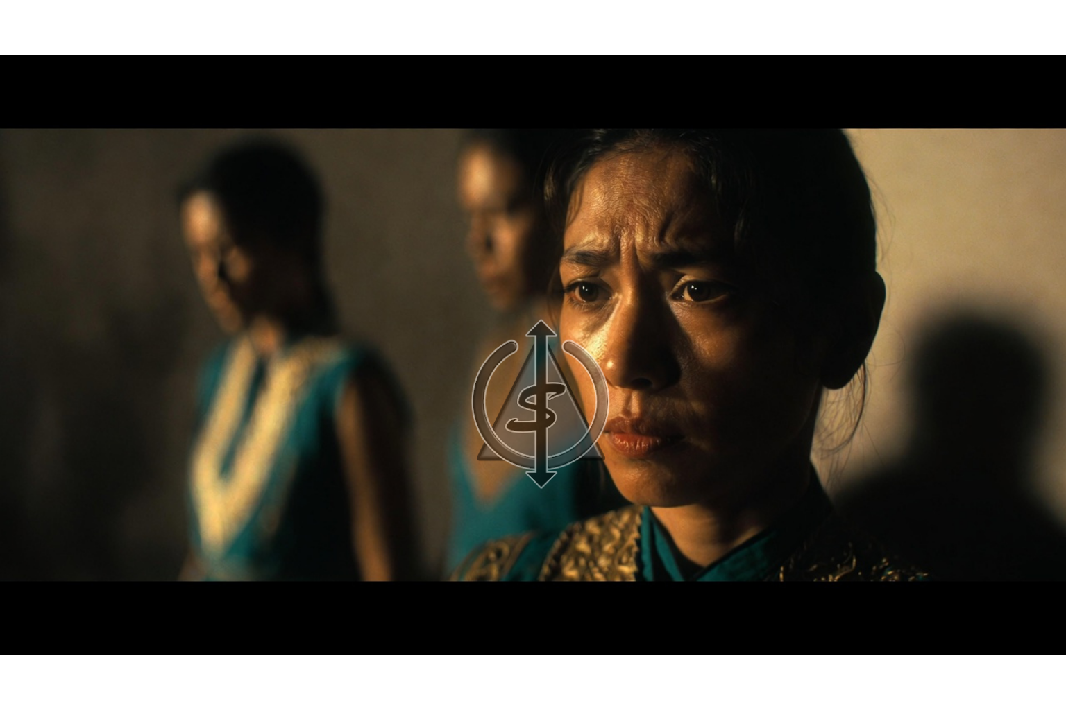 Person standing in focus with two blurred adults behind them in shadow, symbolizing the pain of caregivers who did not protect them and the strength of healing from that betrayal.