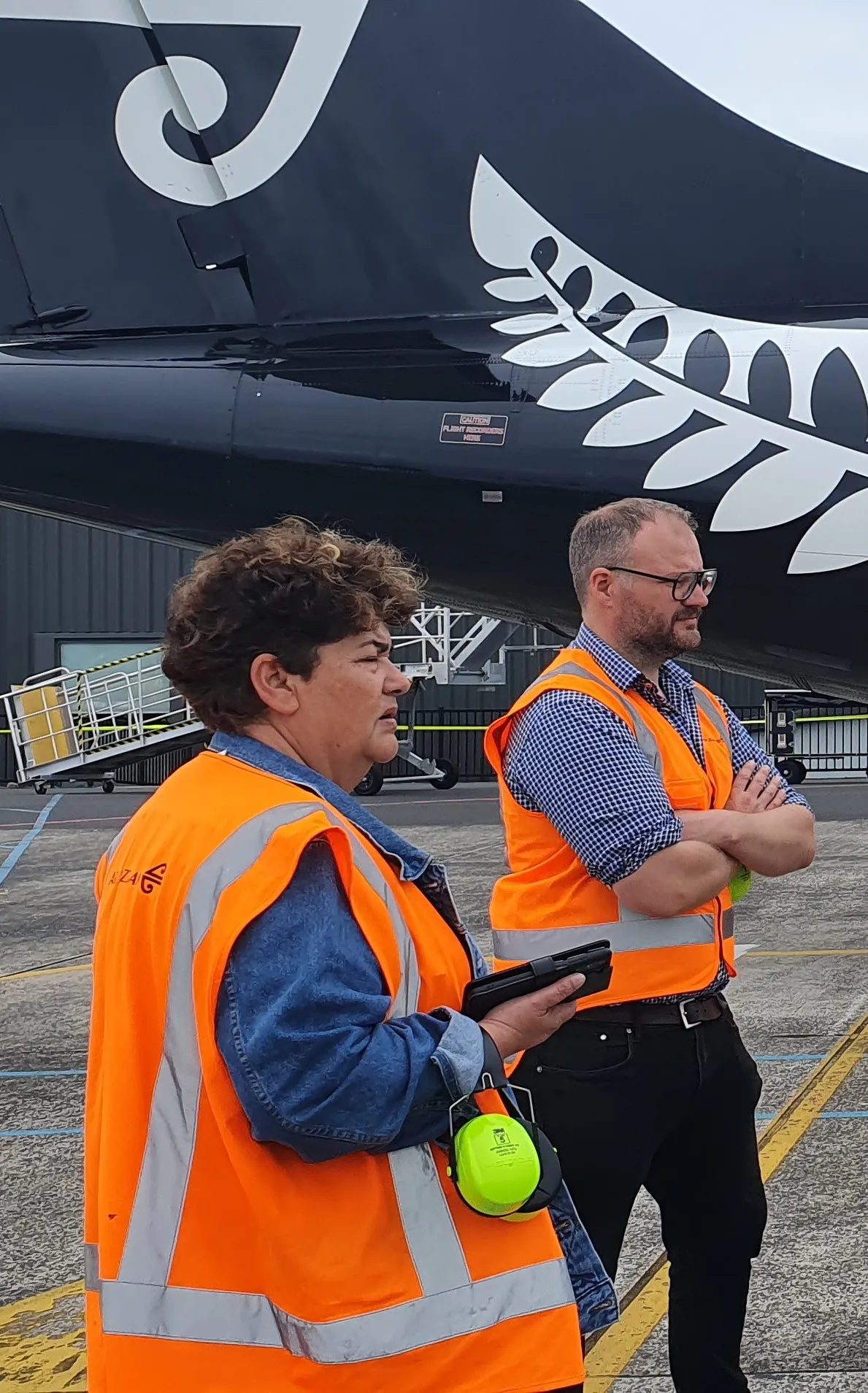 Career Advisors next to aircraft