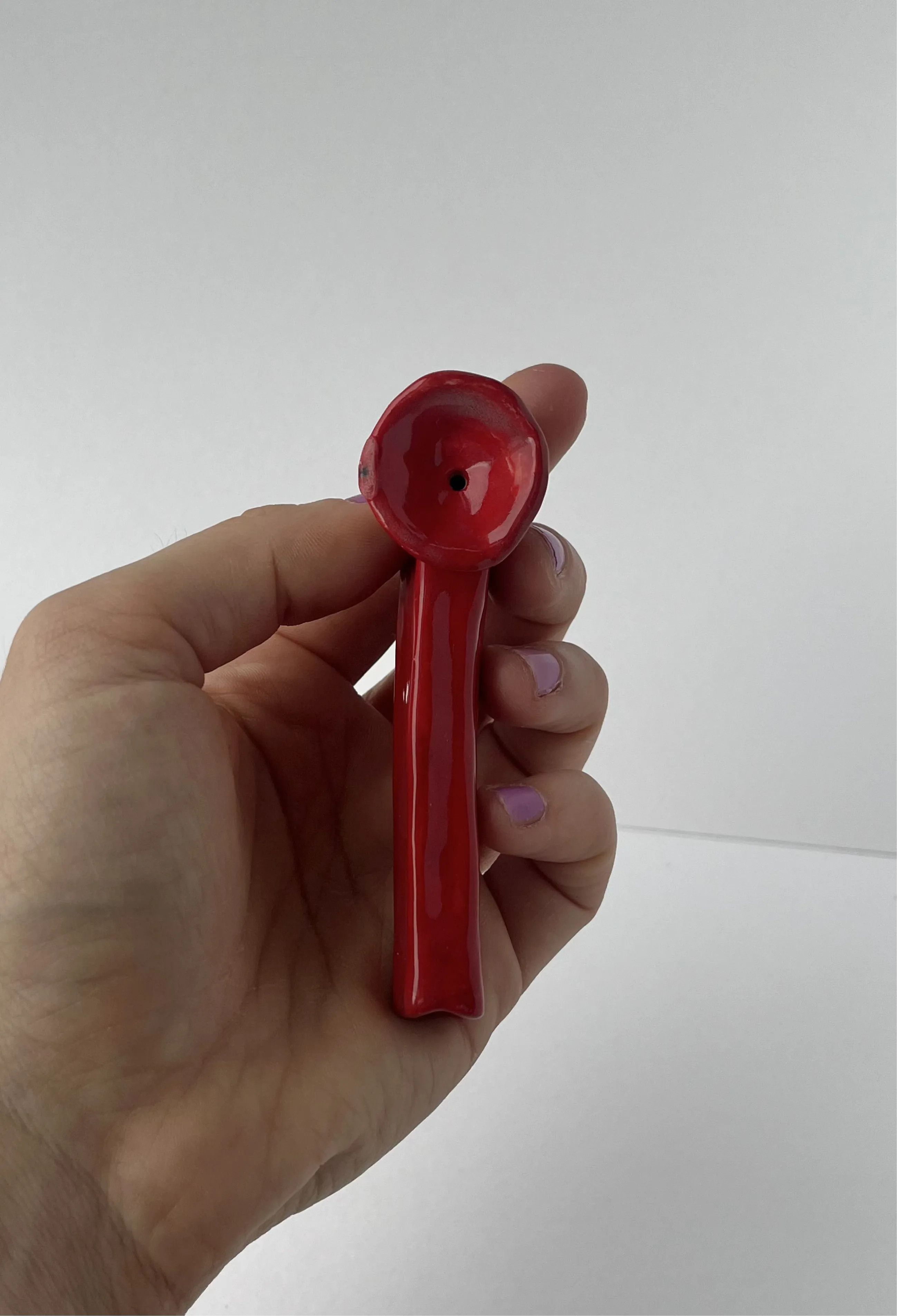 red small smoking pipe.