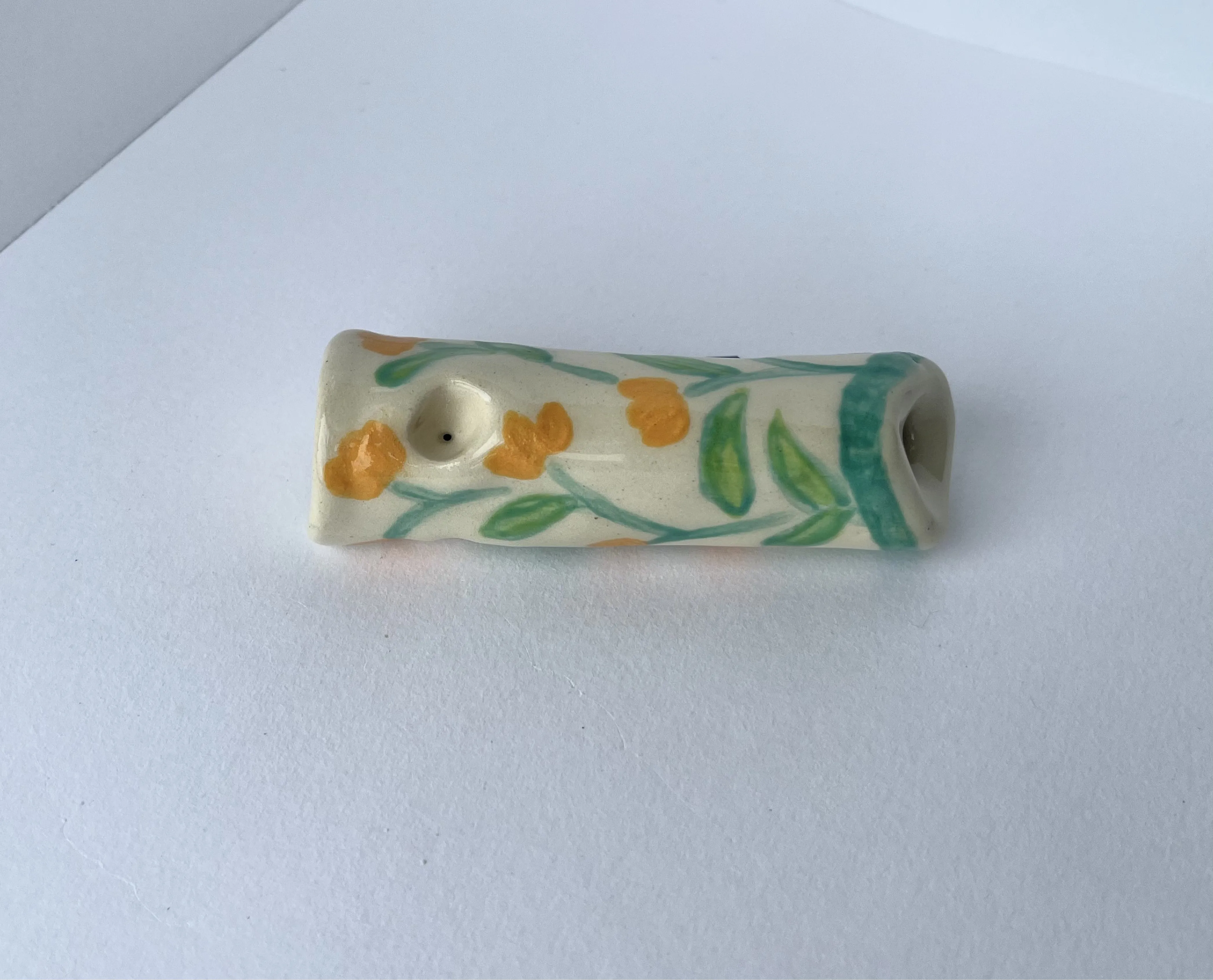 Floral smoking pipe.