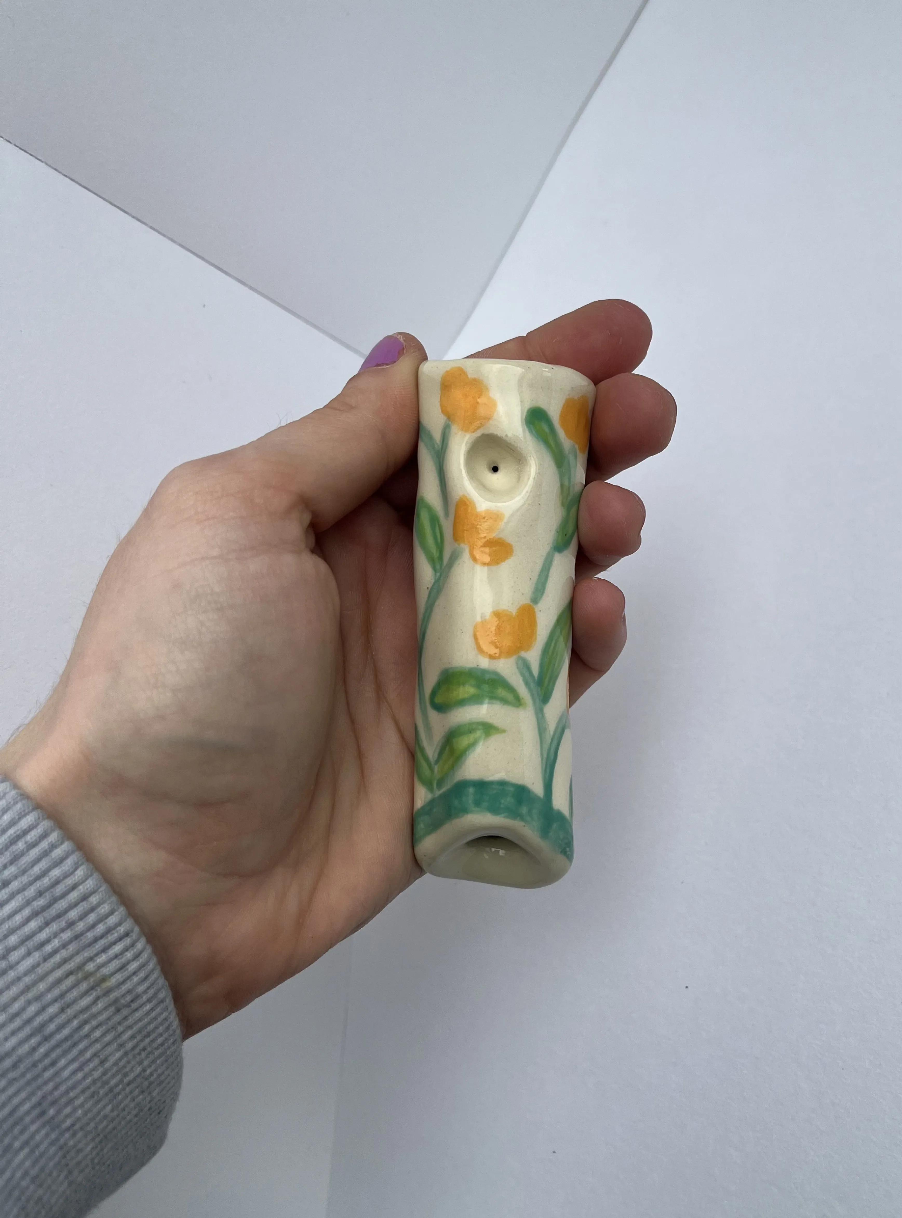 Floral smoking pipe.