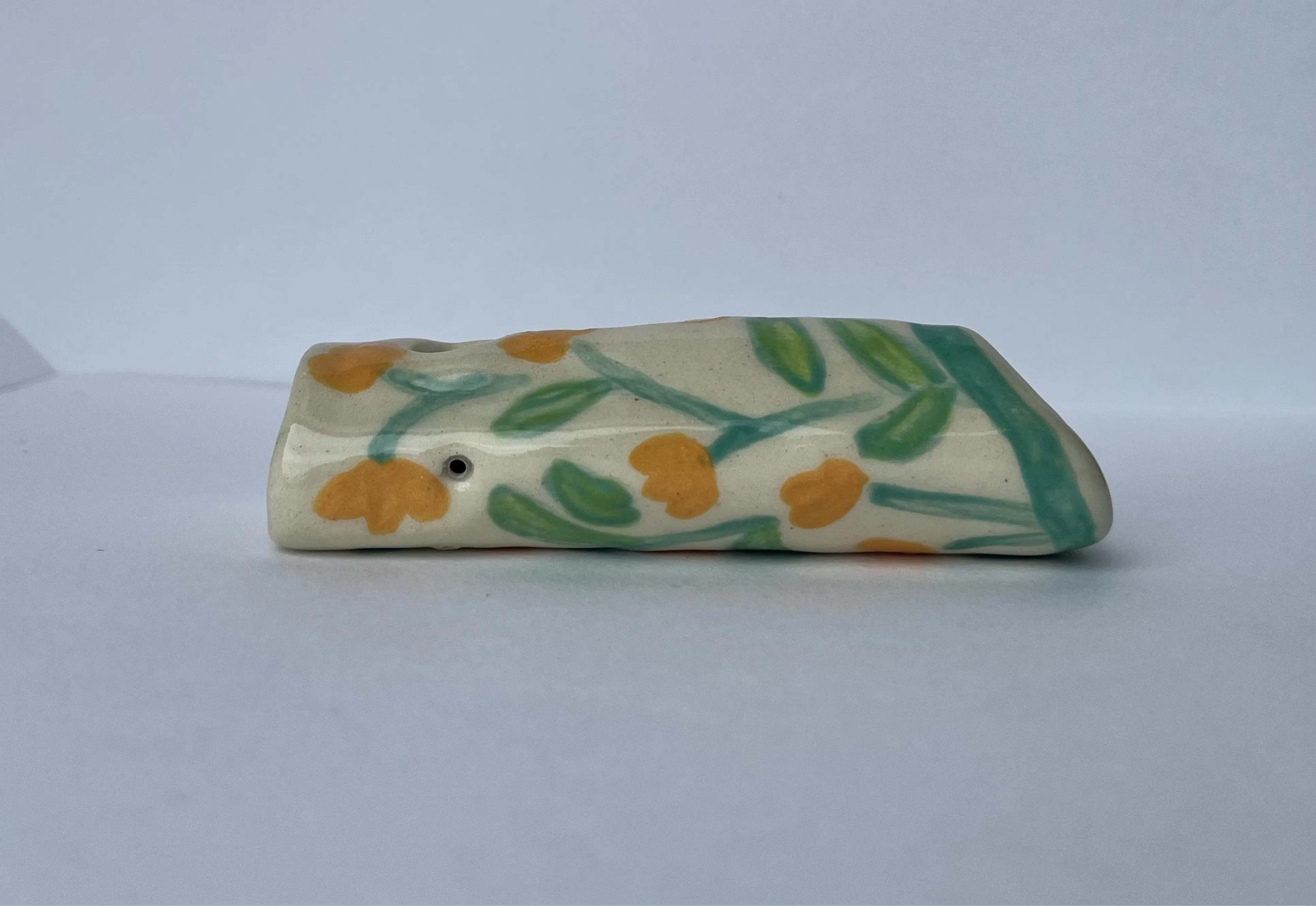 Floral smoking pipe.