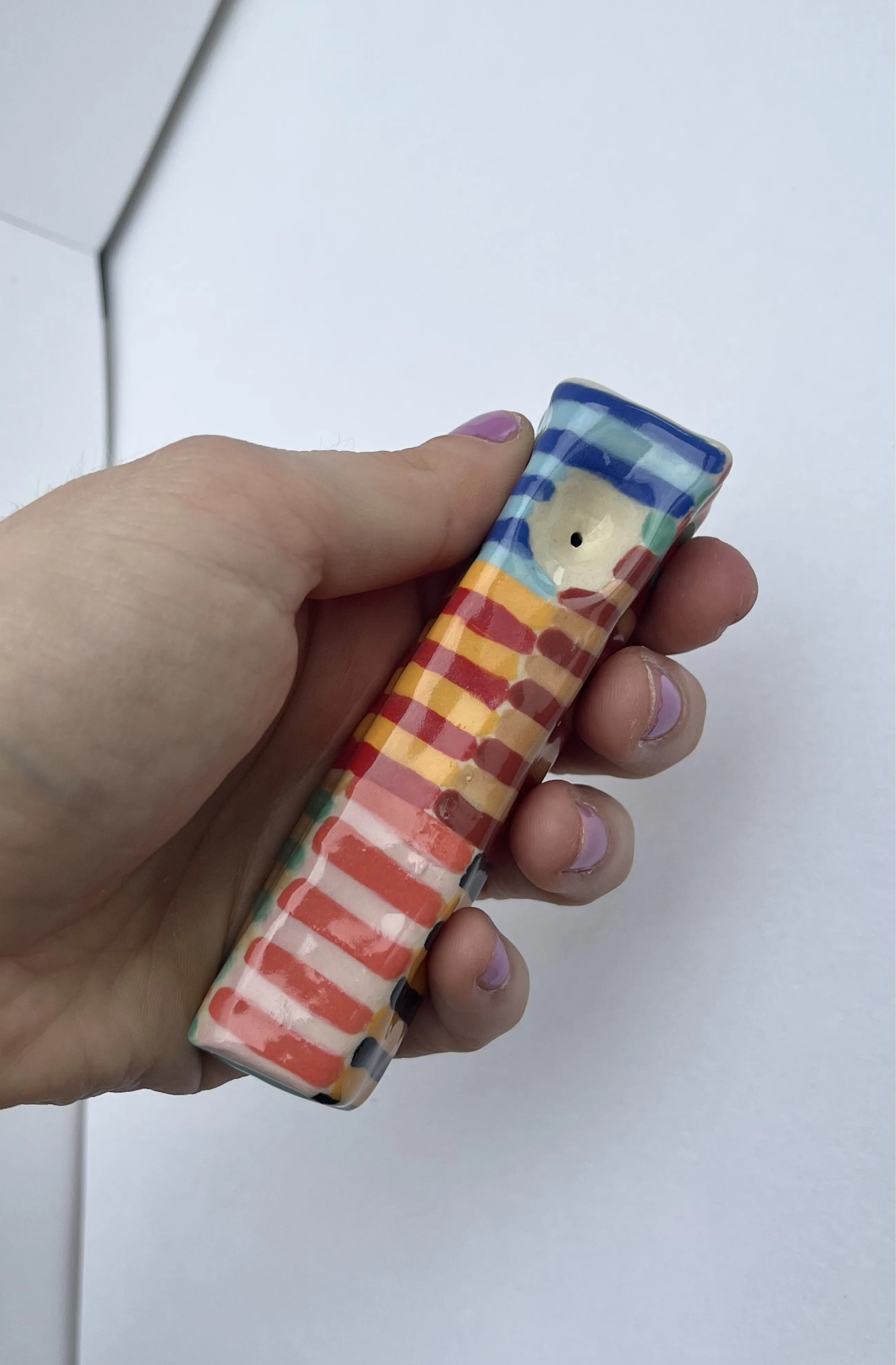 striped boxy smoking pipe.