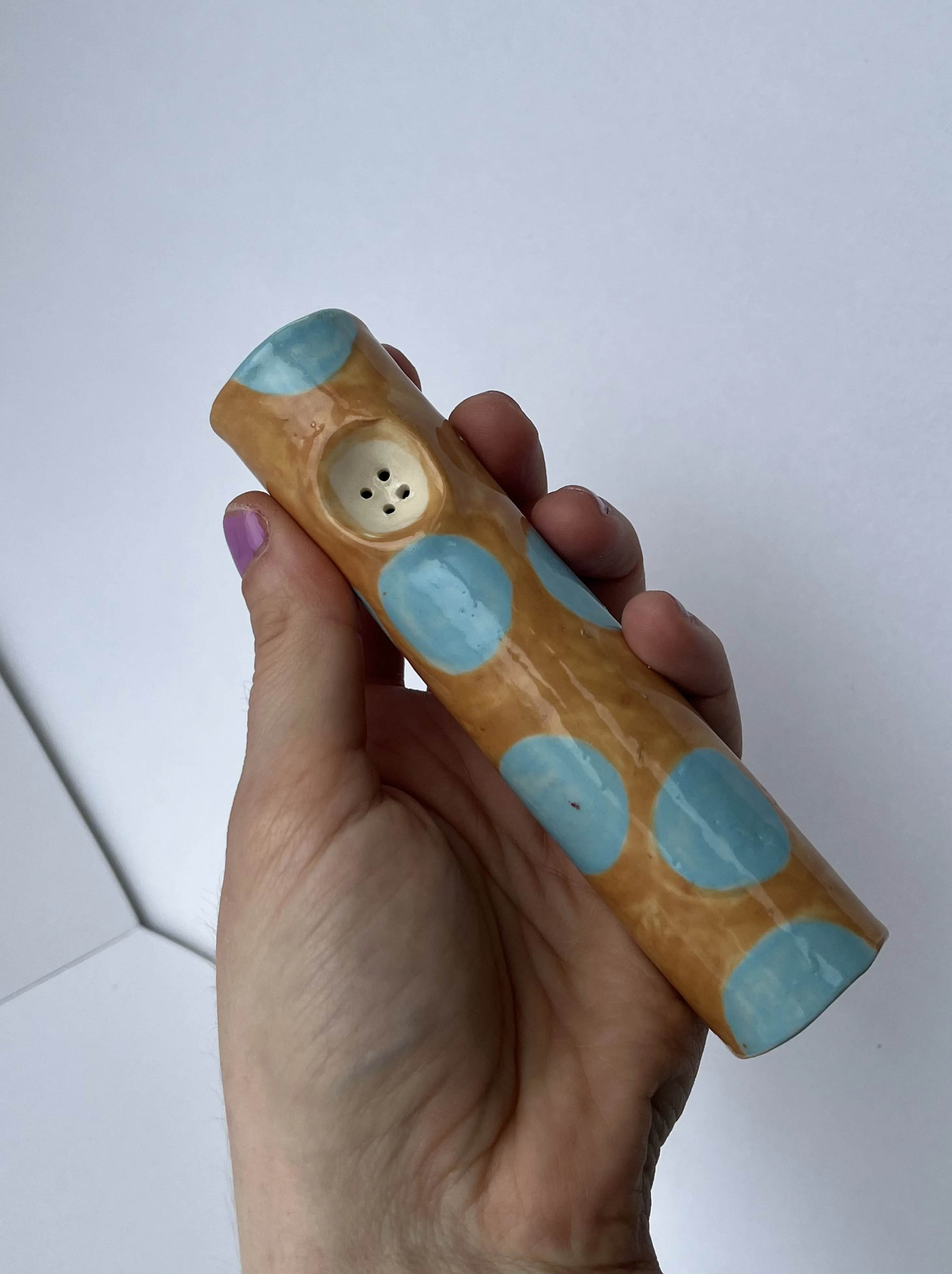 polka dot smoking pipe.