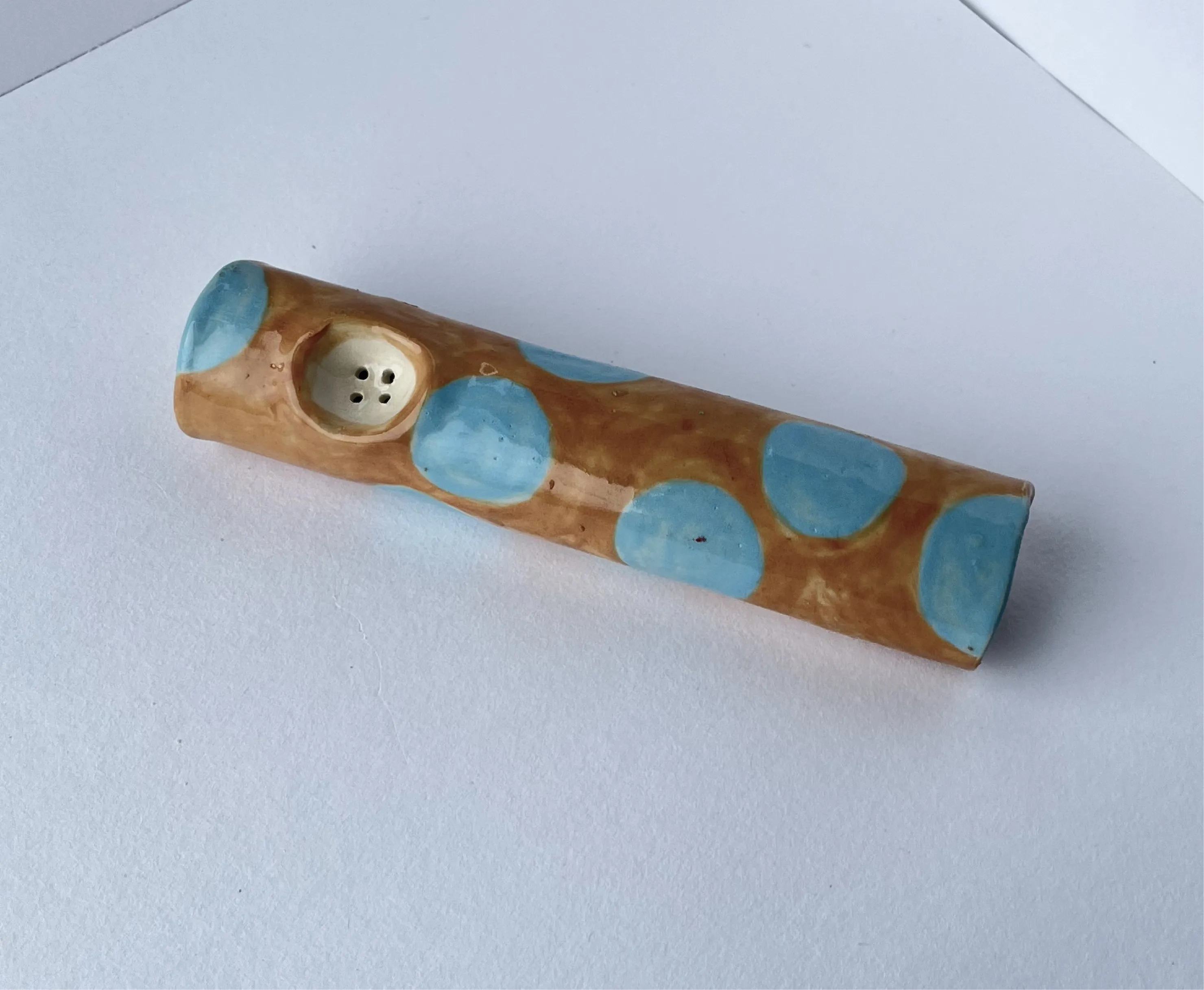 polka dot smoking pipe.