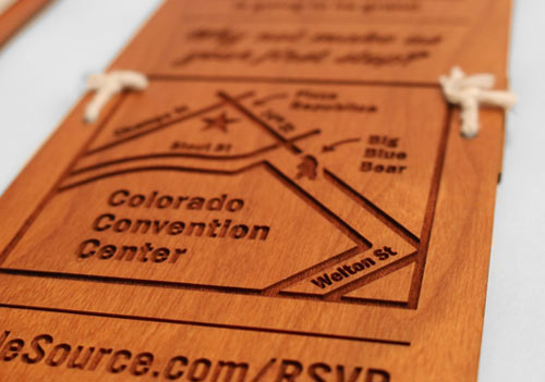 Back of wooden engraved invitation