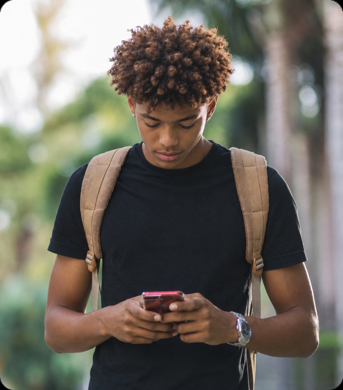 Teen using Bible Loop on his phone