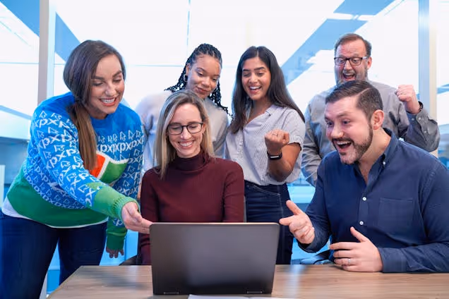 https://www.datocms-assets.com/46385/1657012279-happy-workers.jpg?auto=format&fit=max&q=50&w=636