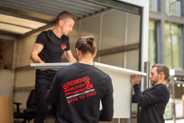 The Removal & Delivery Company Staff Loading Van