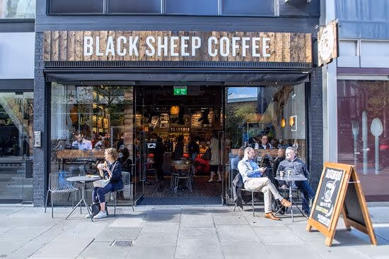 https://www.datocms-assets.com/46385/1655810465-black-sheep-coffee.jpg?auto=format&fit=max&q=50&w=636