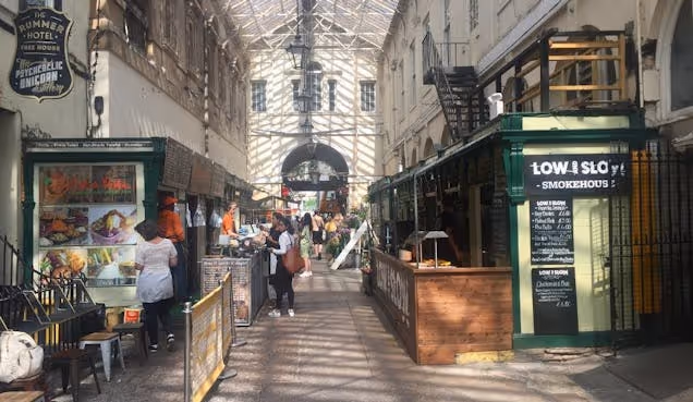 https://www.datocms-assets.com/46385/1654074335-st-nicks-market.jpg?auto=format&fit=max&q=50&w=636