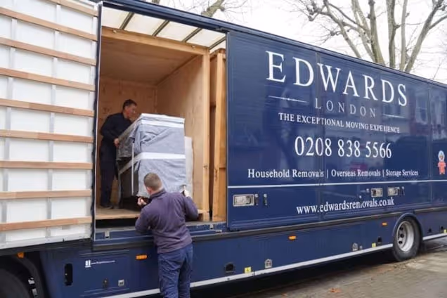 Edwards Removals Men Loading a Van
