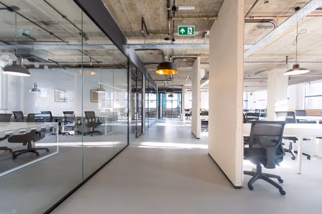 An image of an office and co working space, industrial style.