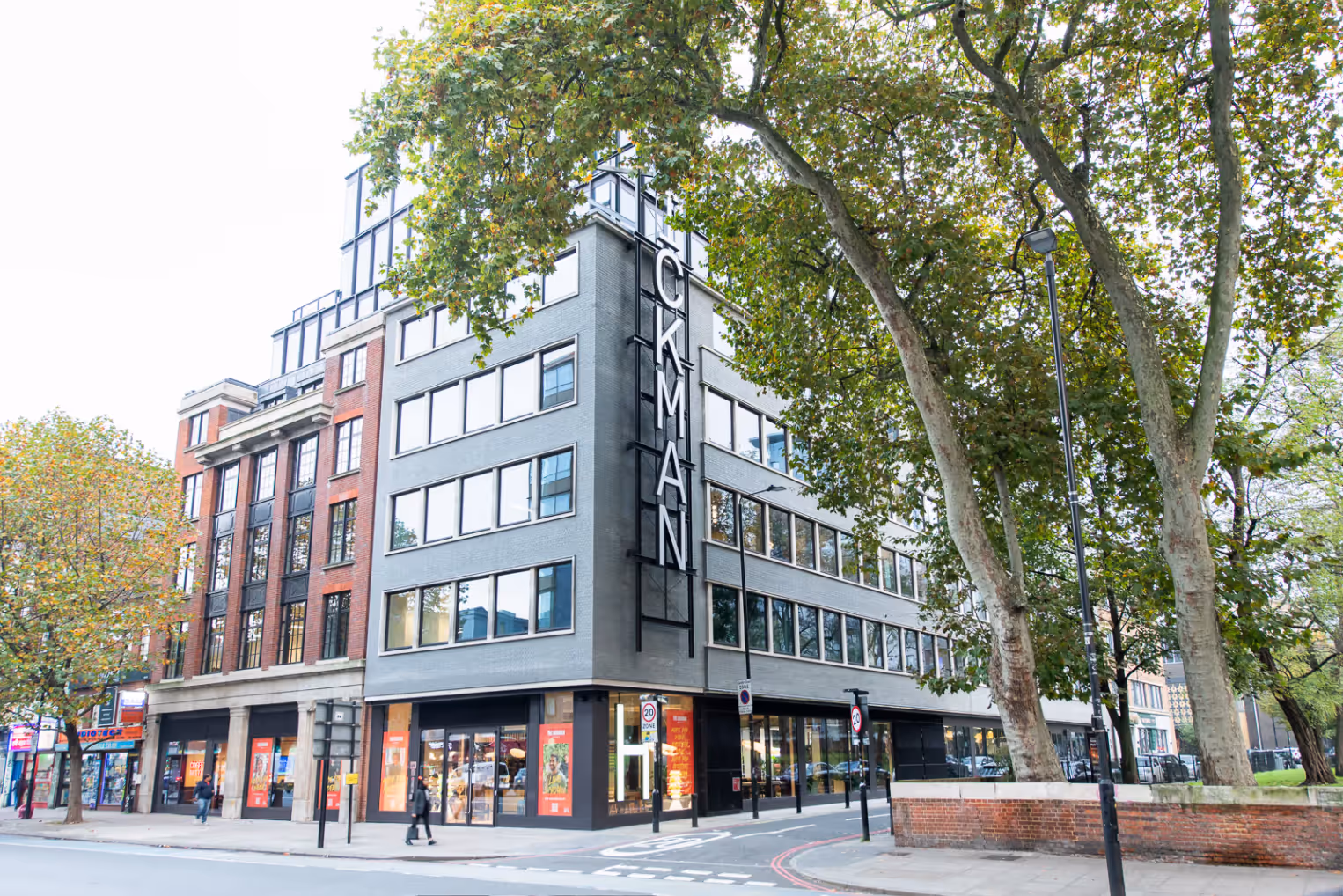 Runway East Aldgate East Building Exterior with a leafy tree over arching the building