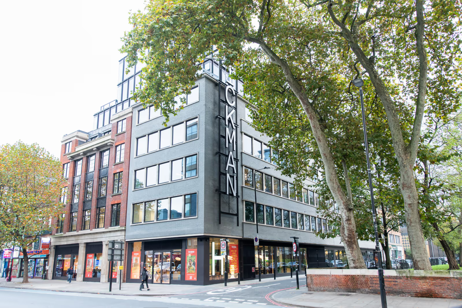 Runway East Aldgate East Building Exterior with a leafy tree over arching the building
