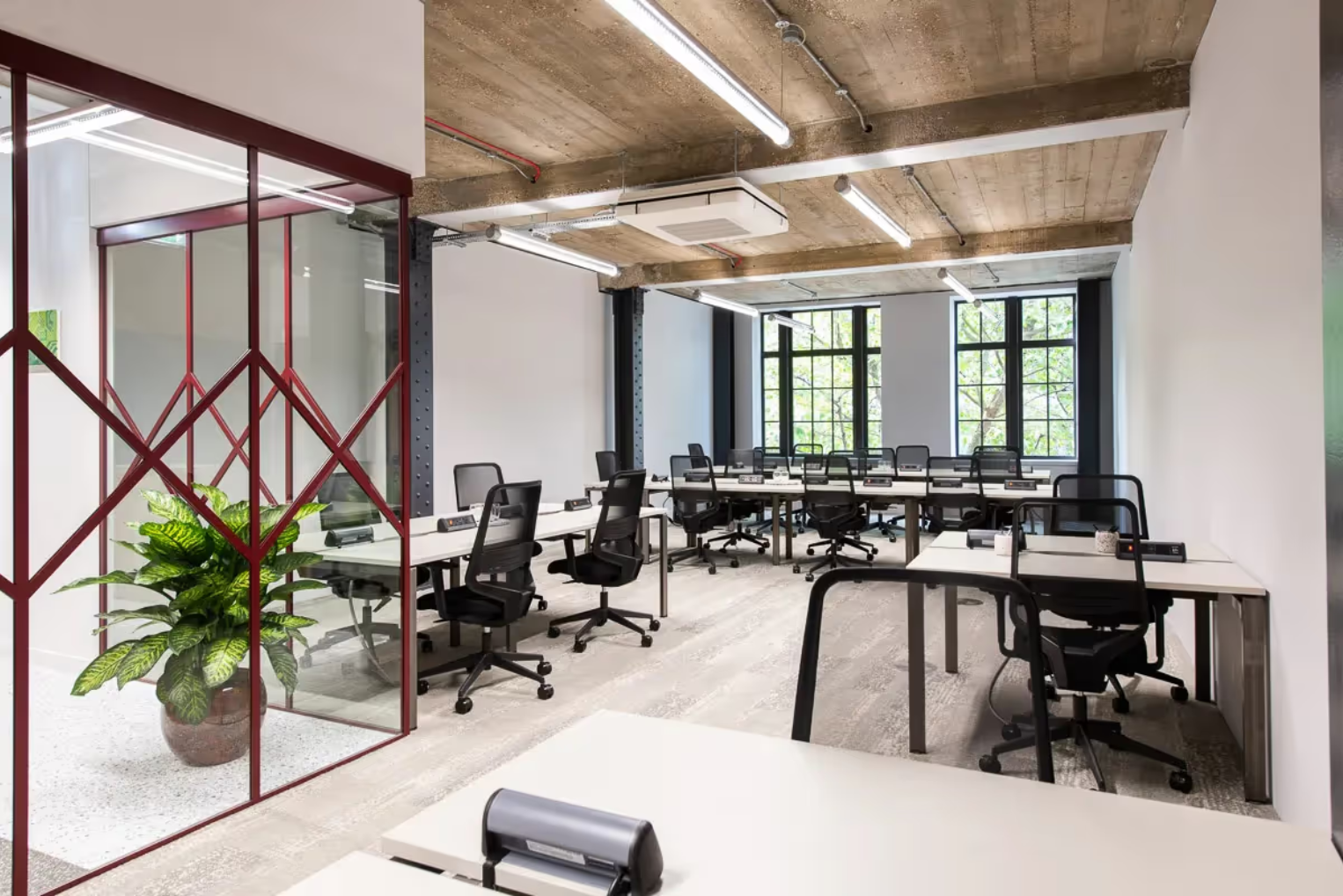 Runway East Aldgate East office space with large windows letting natural light in