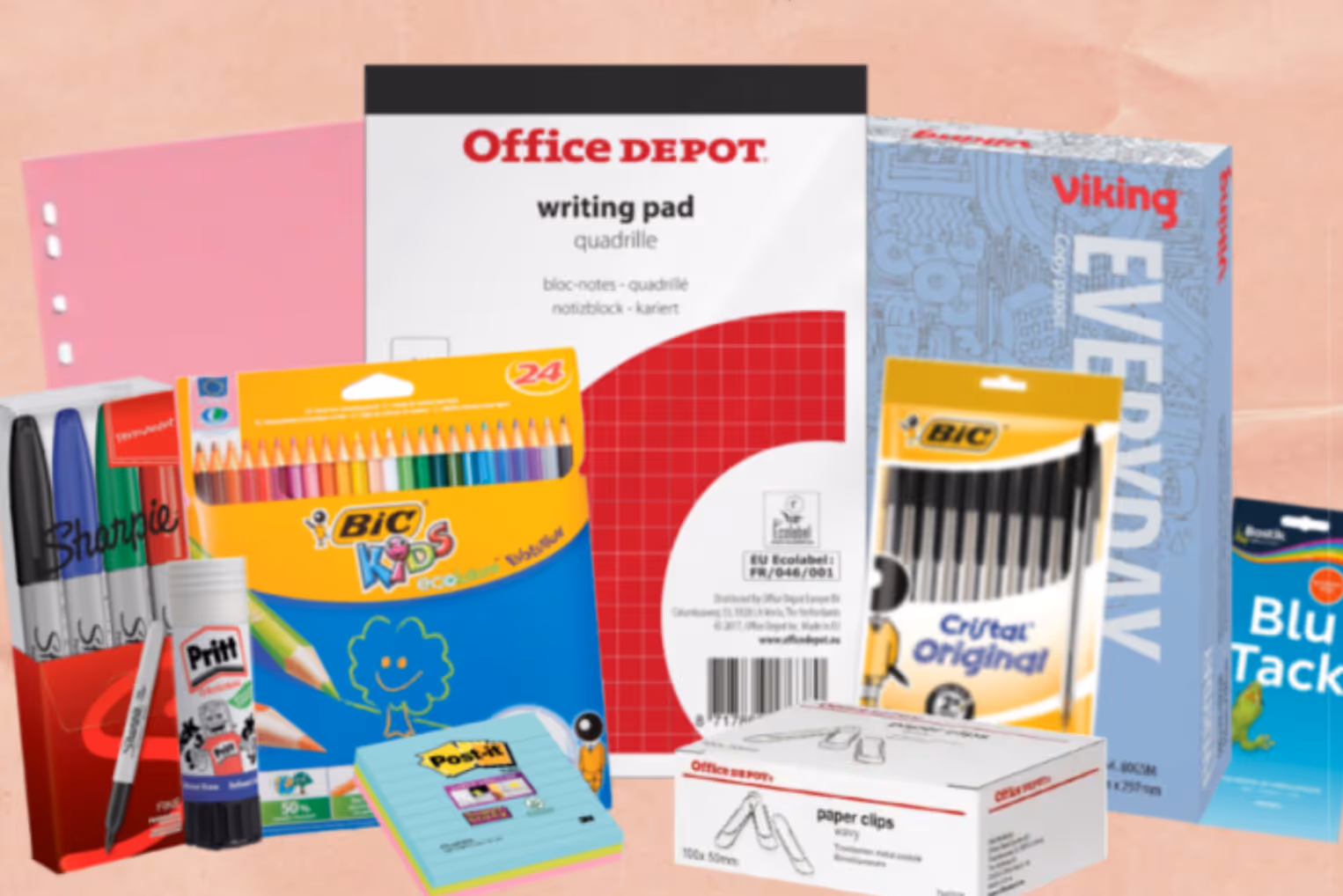 A collection of assorted school and office supplies, including a writing pad, colored pencils, markers, glue sticks, sticky notes, and paper clips.