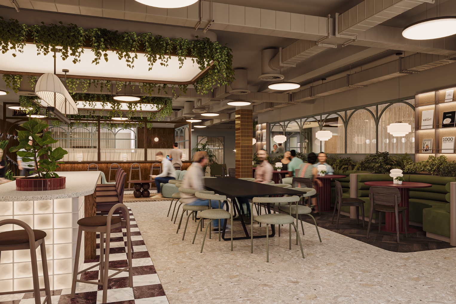 Coworking hub with green seating, a communal table, and a marble bar. Greenery-draped lights and dark wood furniture