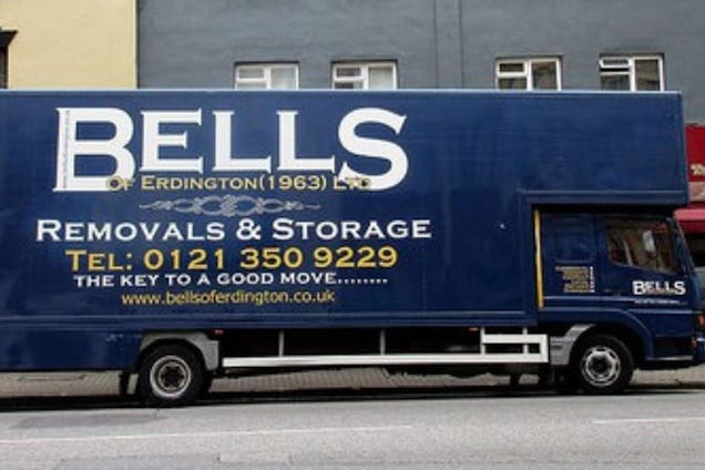 A blue Bells of Erdington removals and storage truck parked on a street.