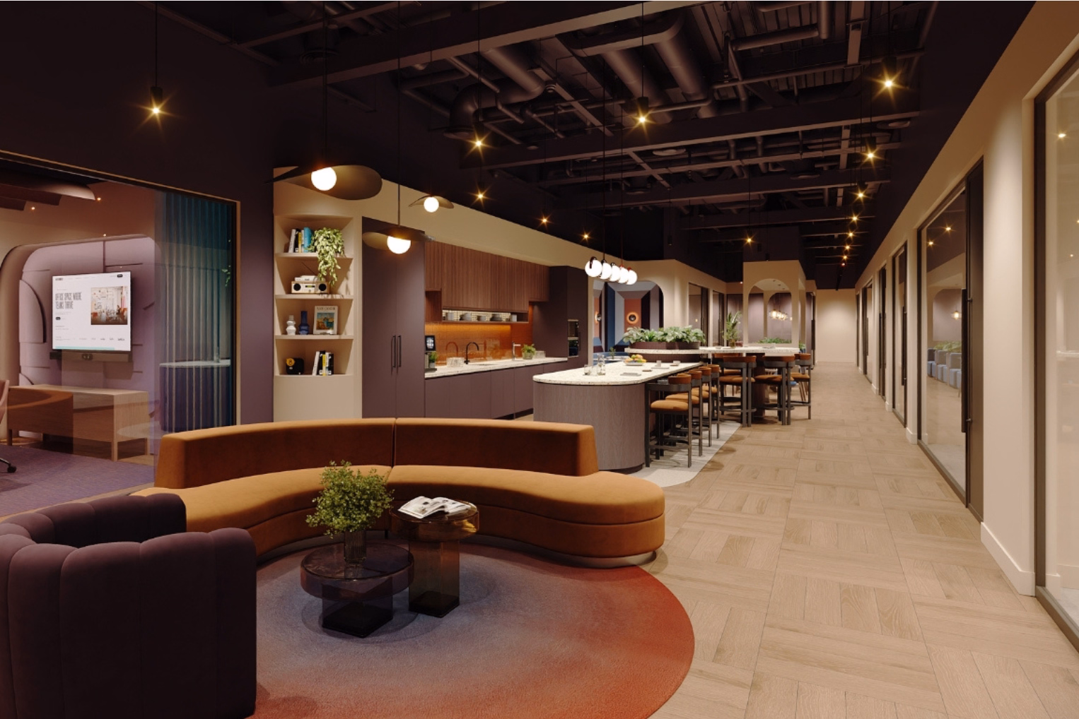 A curved tan sofa and a purple armchair on a circular rug, with glass coffee tables, opening onto a kitchen area with an island bar and high-top seating.