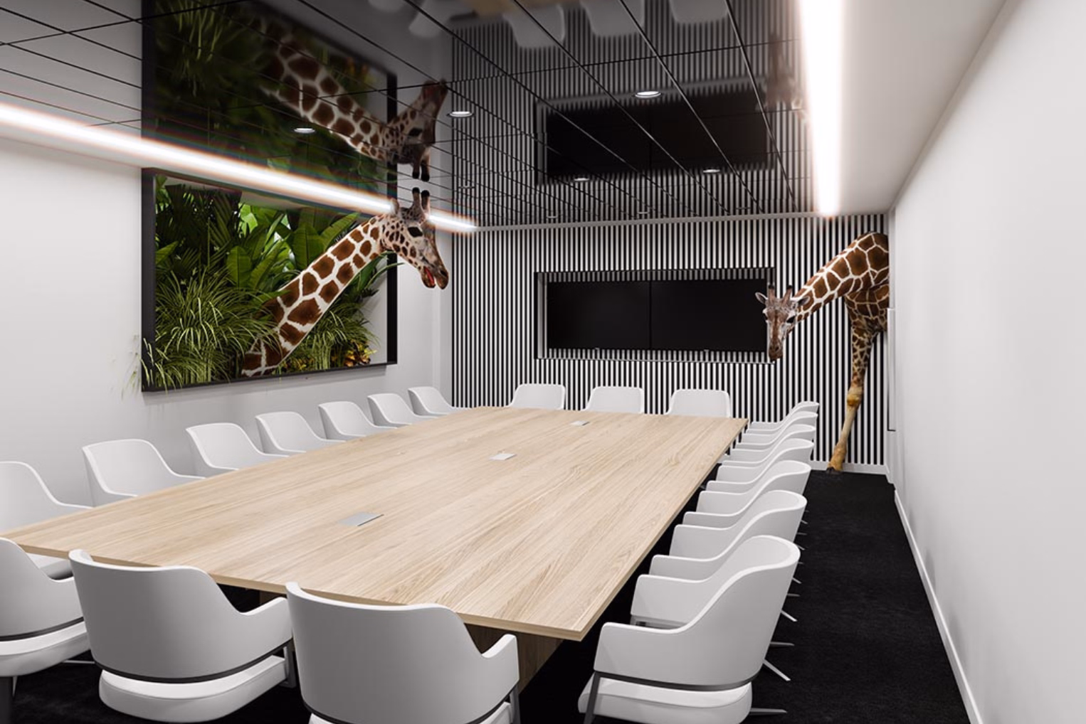 White chairs surround a long table in a meeting room featuring a black-and-white striped accent wall and 3D giraffe statues emerging from the walls.