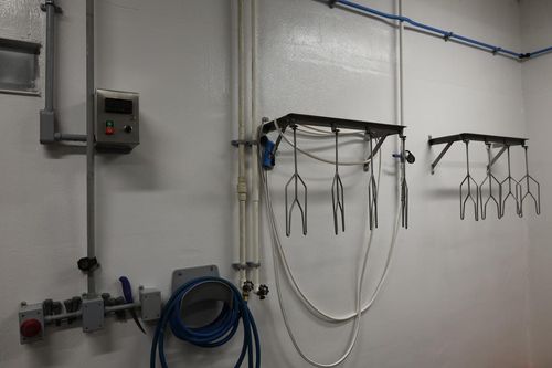 Impact-resistant FX Wall Armour fibre reinforced lining for industrial wash-down rooms in London, Ontario.