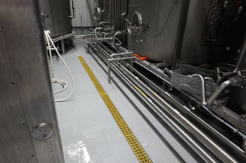 Heavy-duty FX Shield urethane flooring for food processing facilities in St. Marys, Ontario.