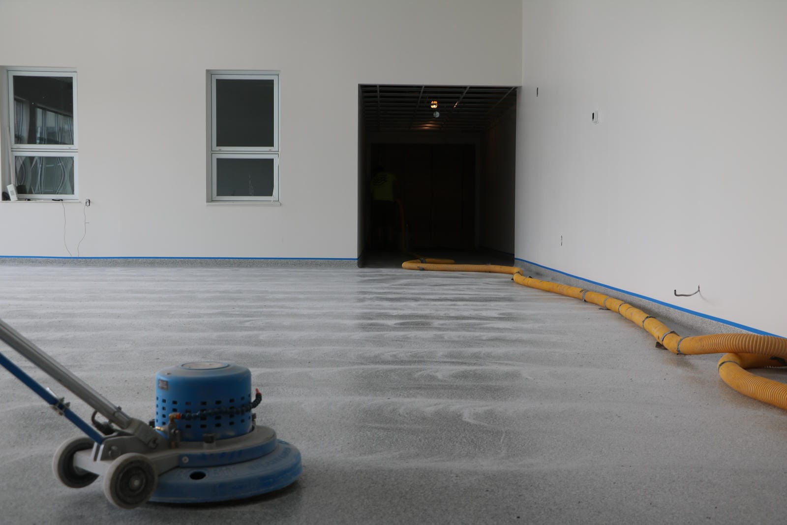 Epoxy flake floor with 4 inch rolled radius cove in School for Sarnia Ontario