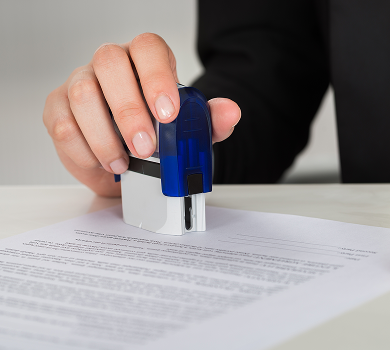 Hand stamping an approved trademark application – Trademark application in the Philippines
