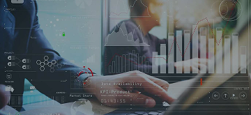 Professional analysing business data on a laptop