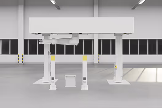 Robotic arm enclosed in a white stationary industrial structure inside a spacious factory with large windows.