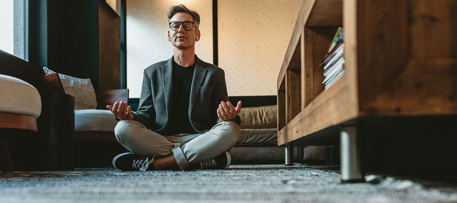 Man meditating during workday