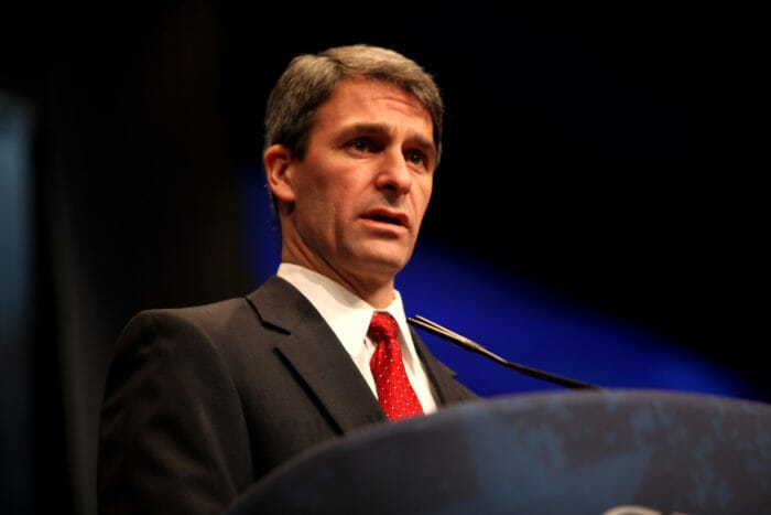 Ken Cuccinelli sanding at a lectern