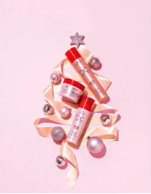 a group of cosmetics in a christmas tree
