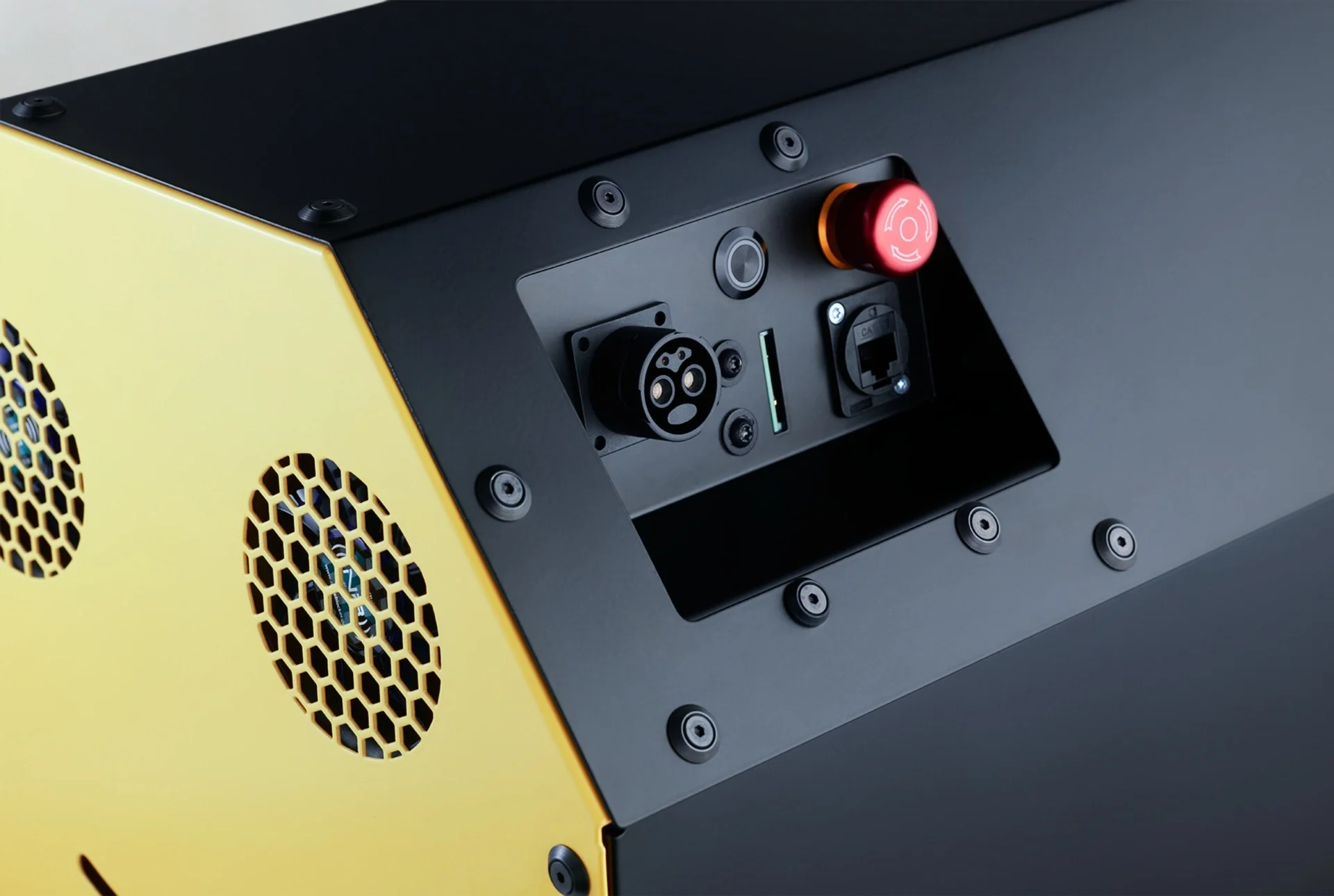 Close-up of the INERGIO Mini connection panel with power, communication, and emergency stop interfaces.