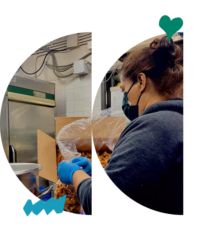 Volunteer wearing blue gloves and face mask packing food items into cardboard boxes in a commercial kitchen, part of Urdu Neighbour Centre's community support services for South Asian families in Hong Kong