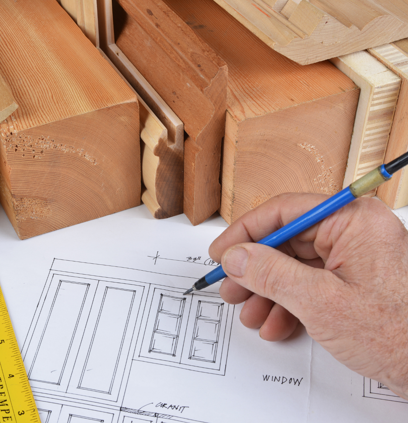 Dave Grecco Owner making plans of remodeling house