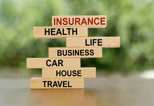 Wooden Blocks Highlighting Insurance 