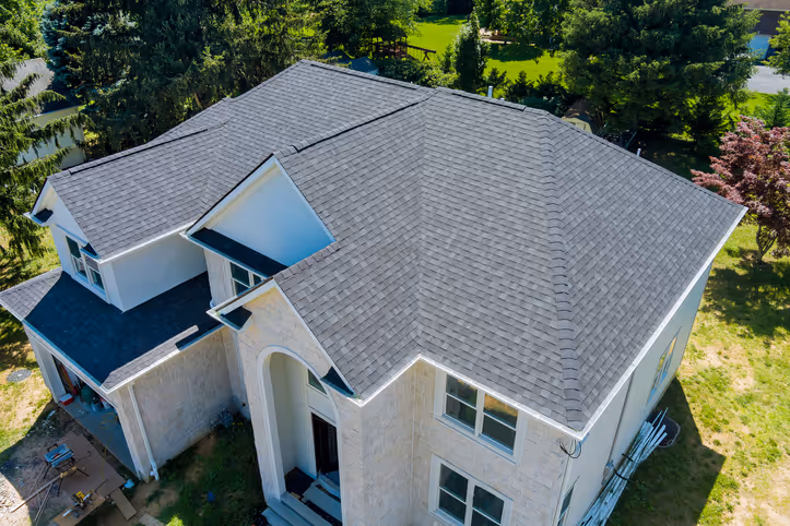Roof replacement after - aerial view of completed roofing project by Lodde Roofing - HomeStars verified contractor with 60+ years experience
