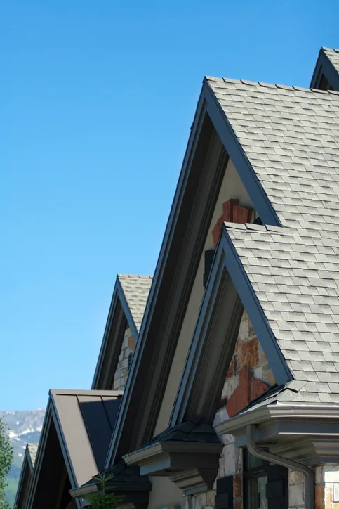 Custom roofing design and installation on Ontario home by Lodde Roofing contractors showcasing unique architectural roofscape with premium shingles