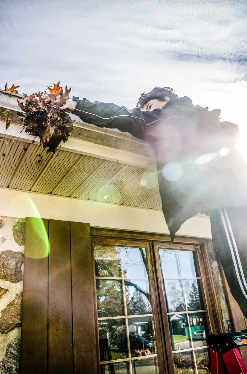 Eavestrough and gutter installation and repair services in Ontario protecting home foundation from water damage by Lodde Roofing specialists