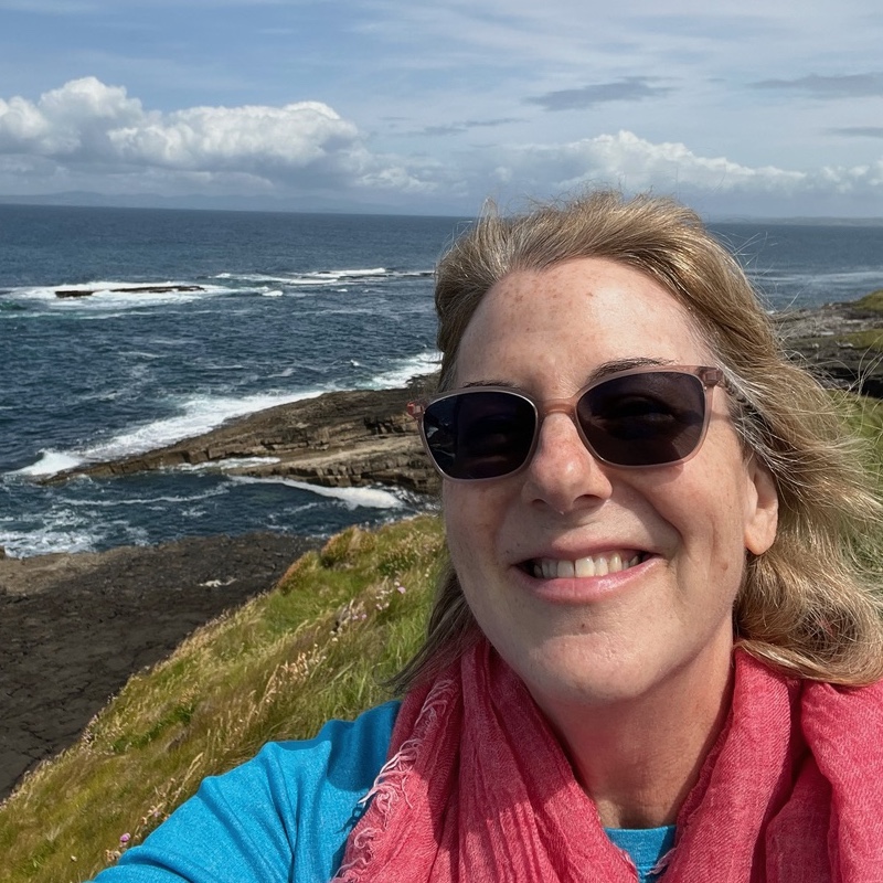 Mary Liz Burns by the ocean