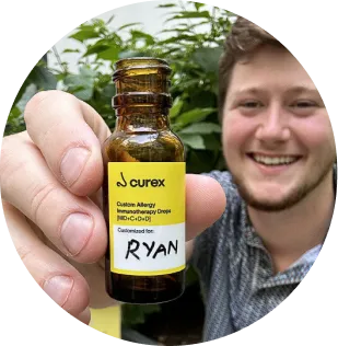 a male patient showing allergy drops vial