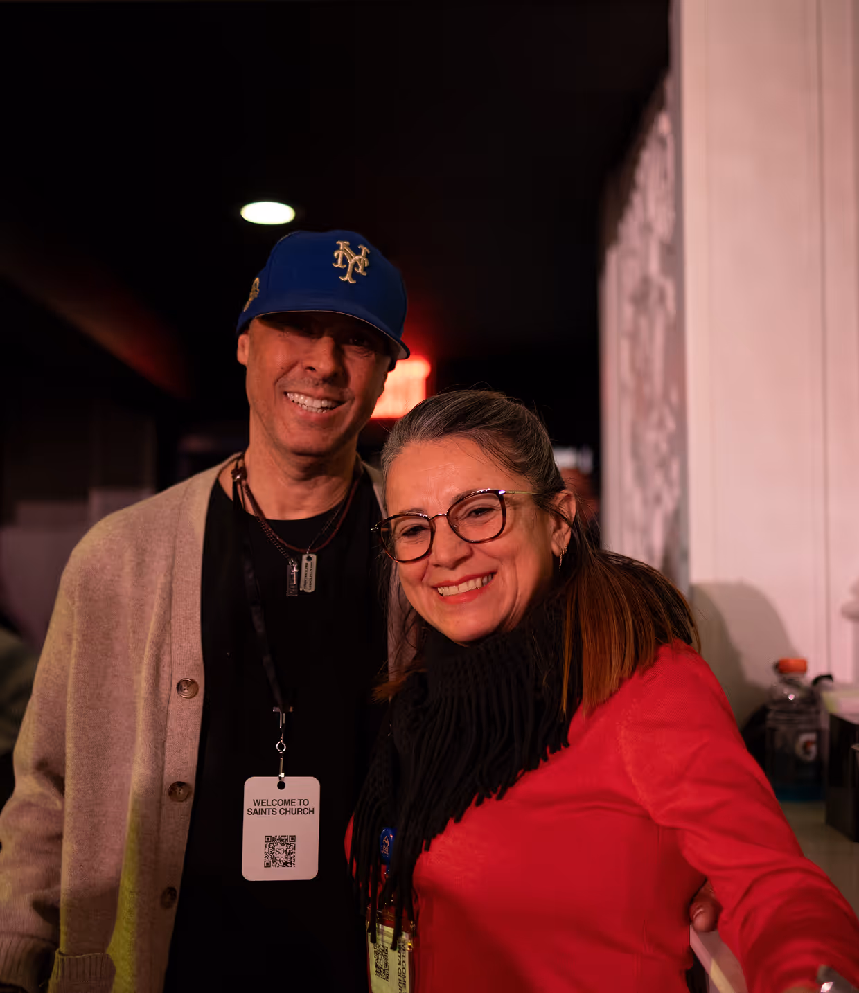 a woman and a man smiling for the camera