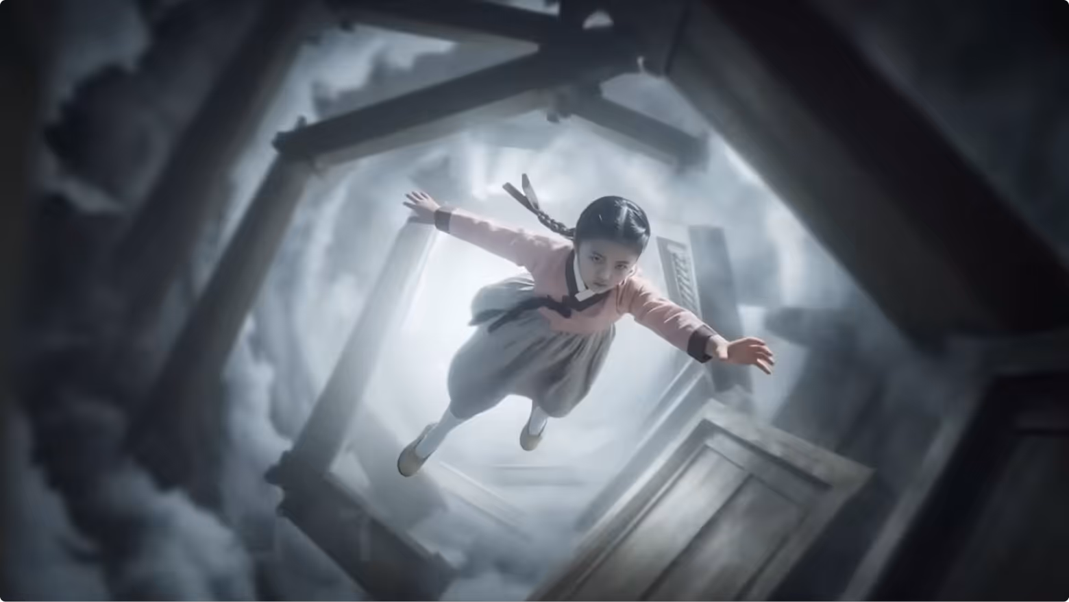 Young girl with braided hair and traditional clothing appearing to float or fly inside a foggy, swirling space with wooden beams and panels.