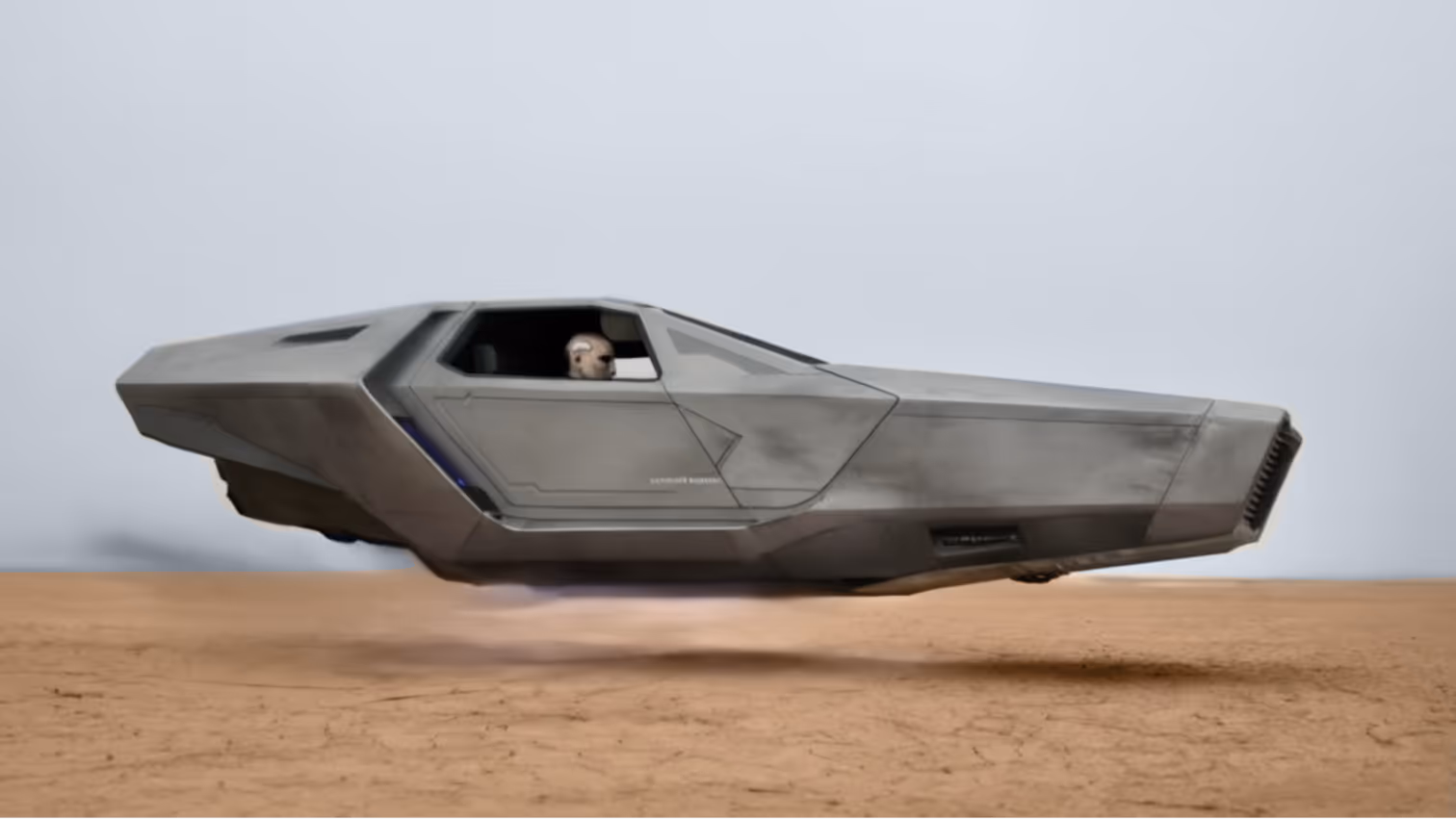 Futuristic gray hover vehicle floating above a cracked desert ground with a person visible in the driver's seat.