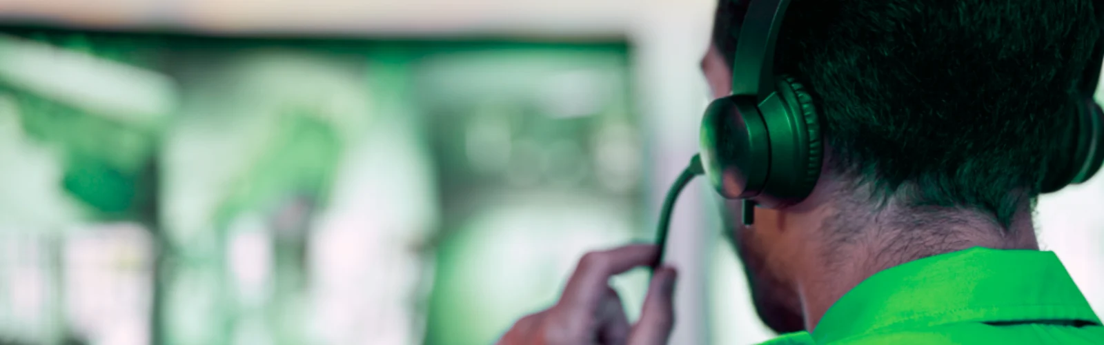 SFL Companies customer support representative wearing green headset